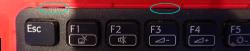 Picture of the clips at the top left of the keyboard near Escape and F3